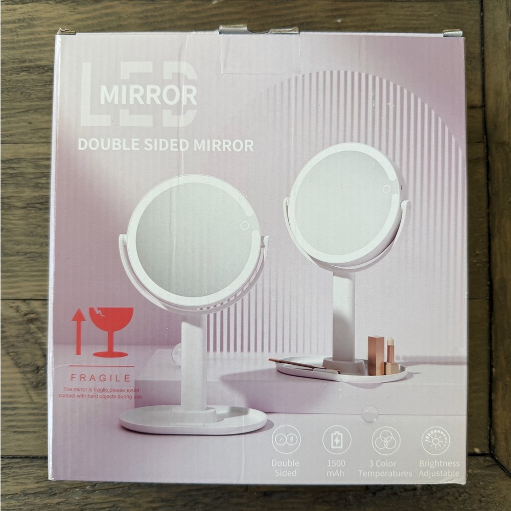 Double sided LED 7 inch mirror
New in box